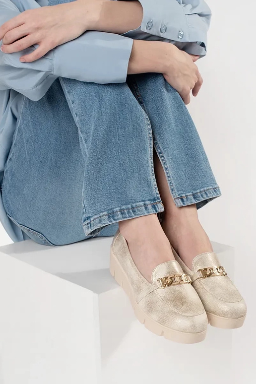 Mocassins em couro dourados com...