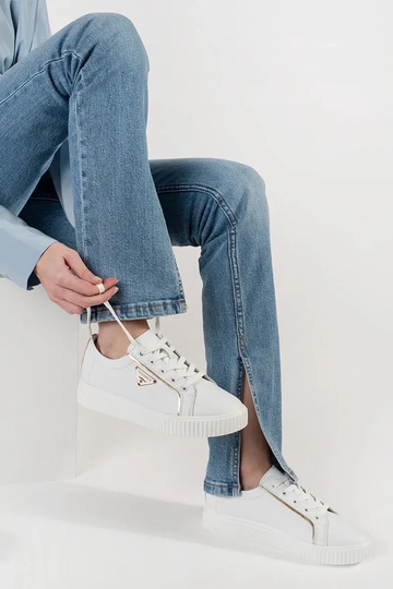 Tênis modelo Sneakers em... 2