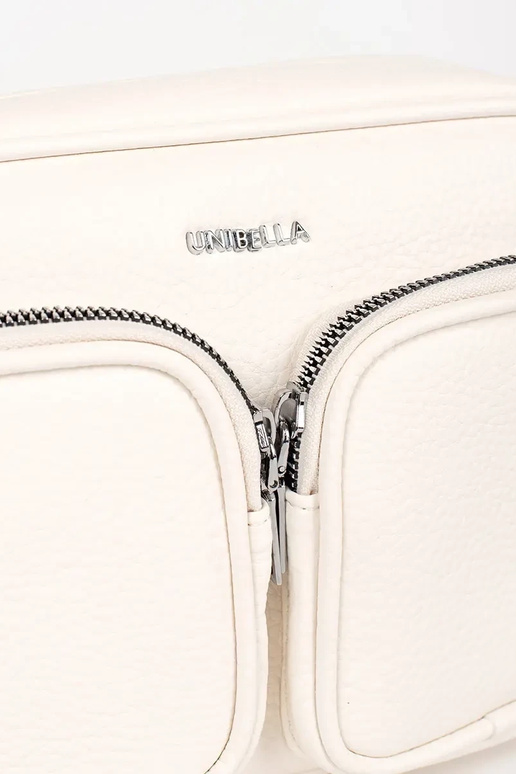 Mini bolsa em cores vibrantes com bolsos