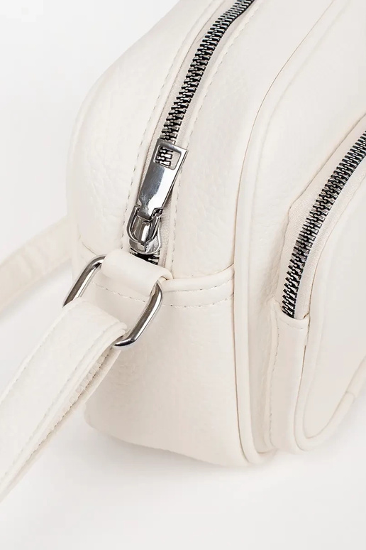 Mini bolsa em cores vibrantes com bolsos