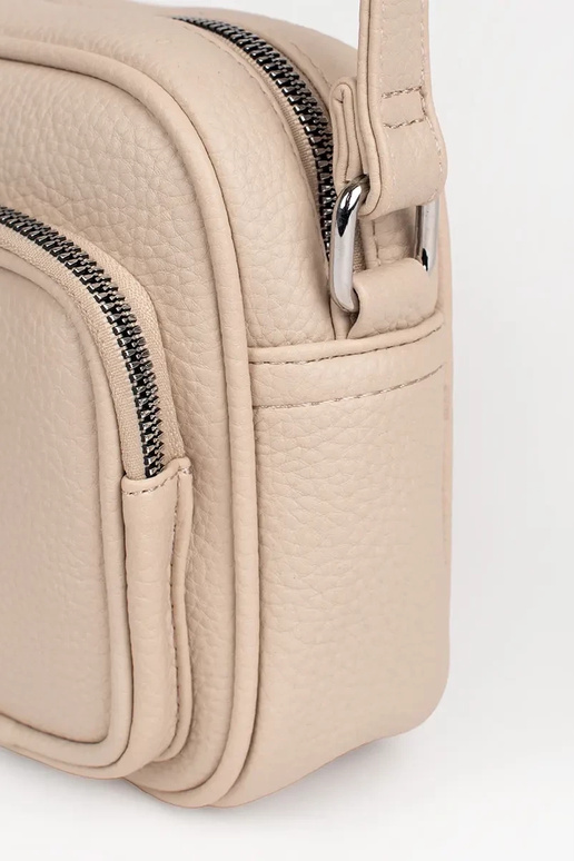 Mini bolsa em tom de marfim com bolsos