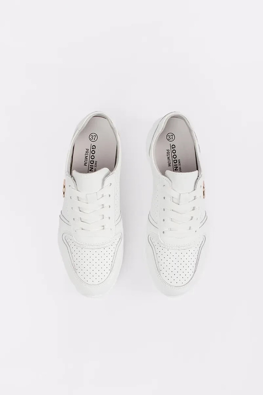 tênis brancos feitos de couro natural