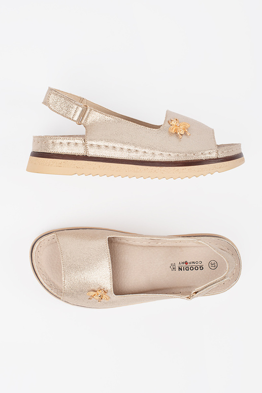 Sandálias douradas com plataforma e...