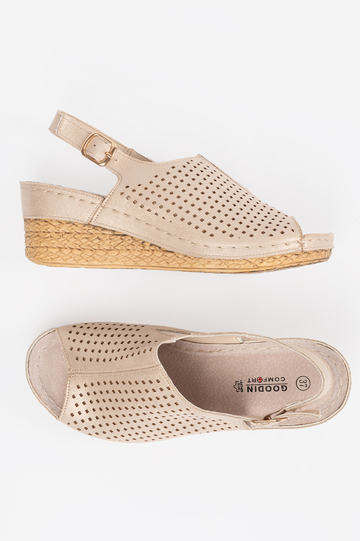 sandálias dourado em uma cunha sandálias dourado em uma cunha