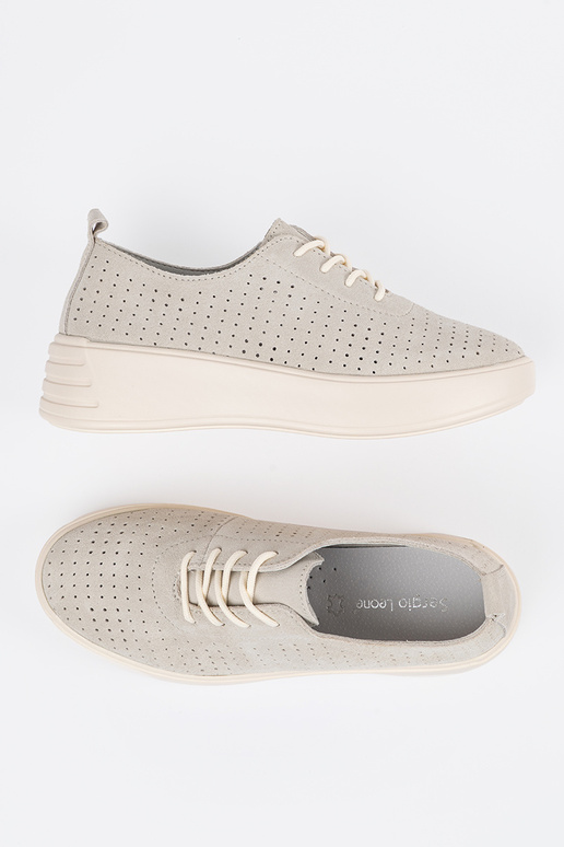 Botas femininas de cano curto em... Botas femininas de cano curto em...