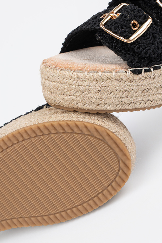 Chinelos cor preta trança com uma... Chinelos cor preta trança com uma...