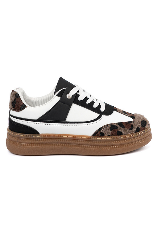 Tênis pretos e brancos estilo...