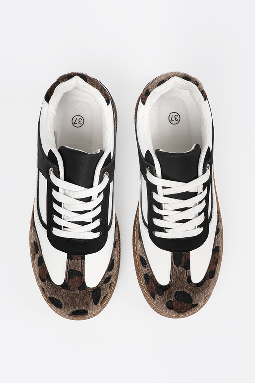 Tênis pretos e brancos estilo...