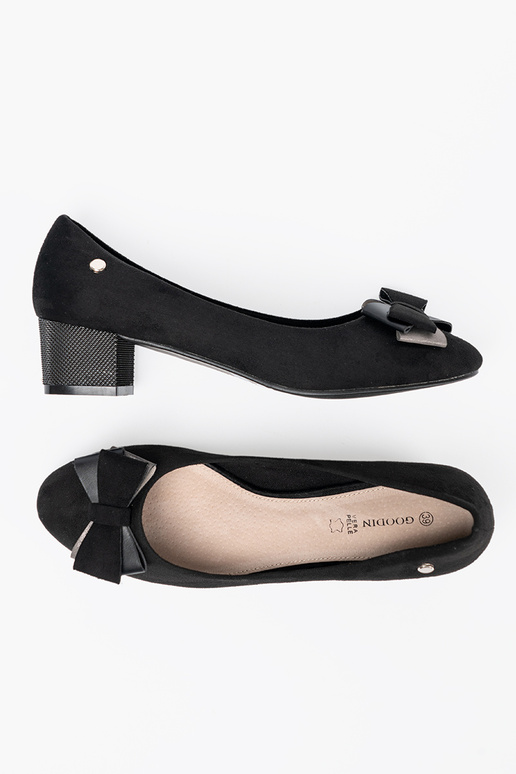 cor preta salto alto com um arco no calcanhar cor preta salto alto com um arco no calcanhar