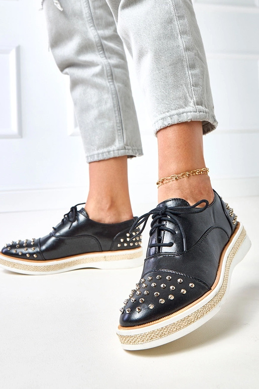 Botas femininas de cano curto com... Botas femininas de cano curto com...