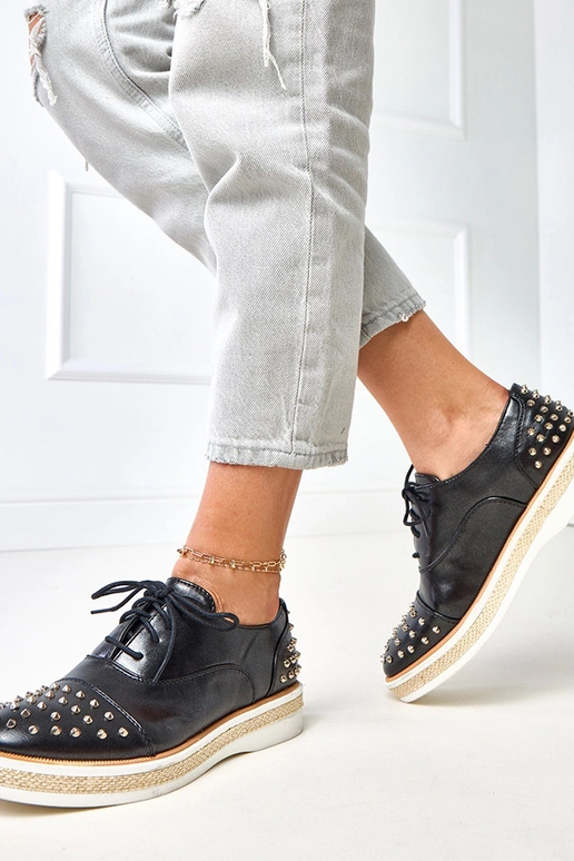 Botas femininas de cano curto com... Botas femininas de cano curto com...