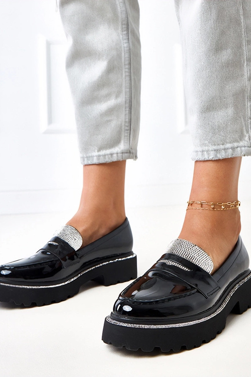 Mocassins pretos em material...