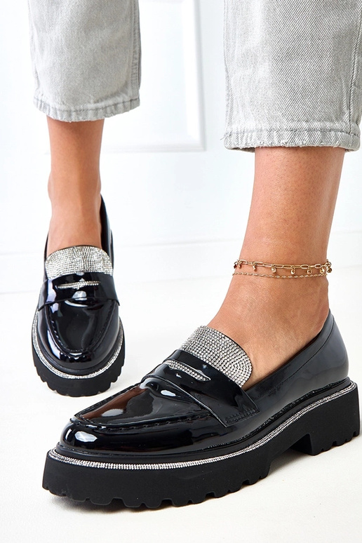 Mocassins pretos em material...