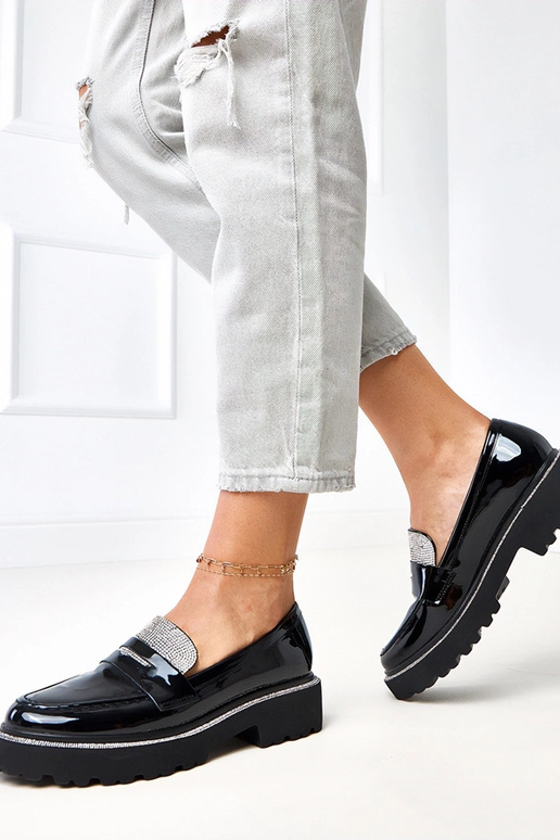 Mocassins pretos em material...