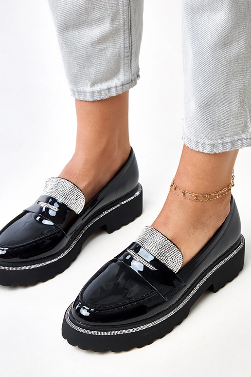 Mocassins pretos em material...