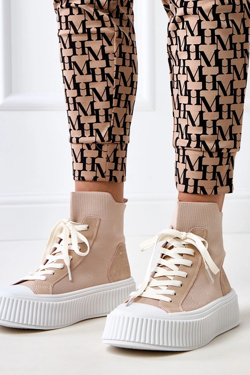 Tênis rosa slip-on tipo meia com... Tênis rosa slip-on tipo meia com...