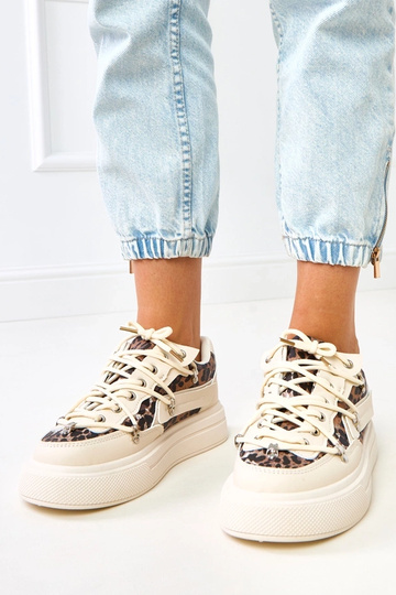 Tênis cor areia com...