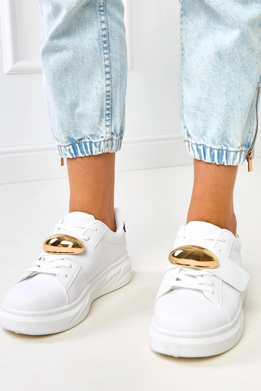 Tênis brancos com plataforma e... Tênis brancos com plataforma e...