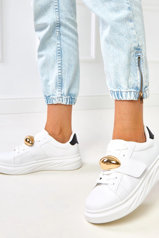 Tênis brancos com plataforma e... Tênis brancos com plataforma e...