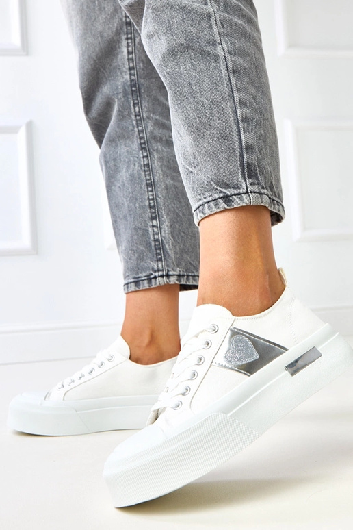 Ténis brancos com plataforma e... Ténis brancos com plataforma e...