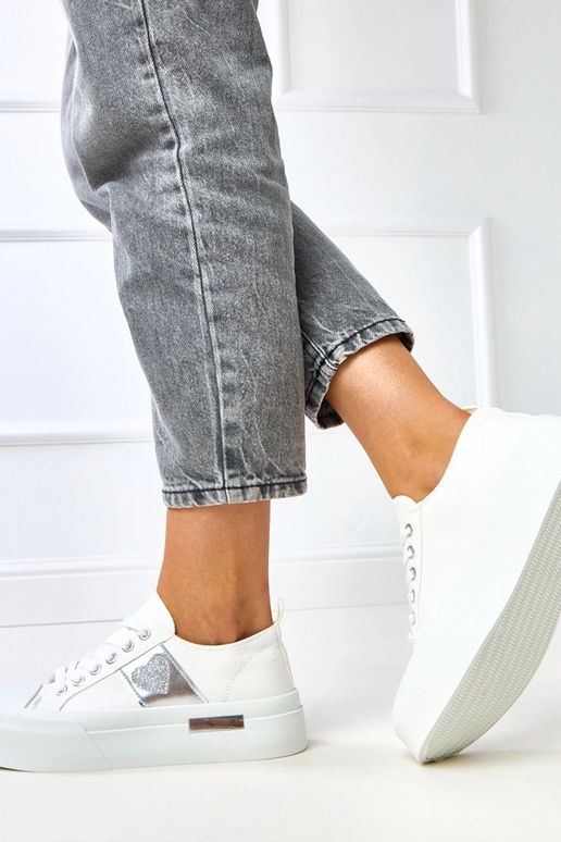 Ténis brancos com plataforma e... Ténis brancos com plataforma e...