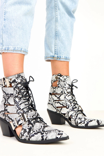 Botins preto e branco de...