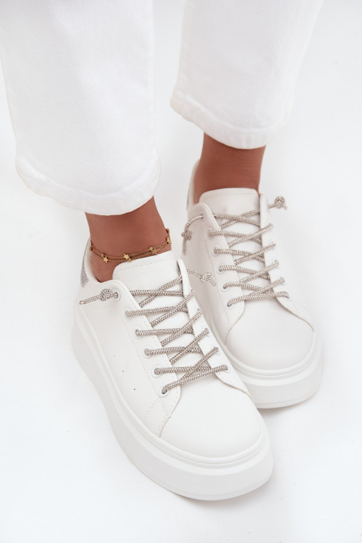 À modalo de tênis Feminino com uma plataforma Com decorações Amarrandom E brilho cor branca Belmira À modalo de tênis Feminino com uma plataforma Com decorações Amarrandom E brilho cor branca Belmira