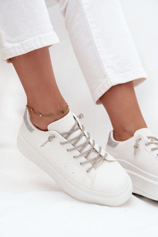 À modalo de tênis Feminino com uma plataforma Com decorações Amarrandom E brilho cor branca Belmira À modalo de tênis Feminino com uma plataforma Com decorações Amarrandom E brilho cor branca Belmira