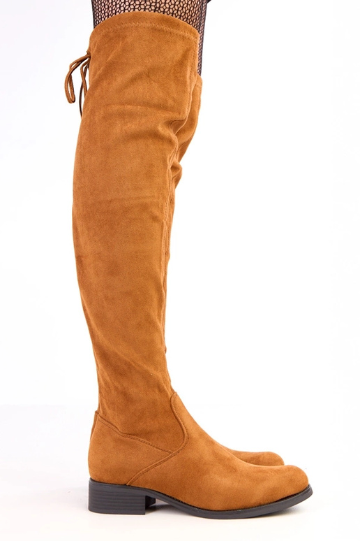 Botas marrons de cano longo com sola...