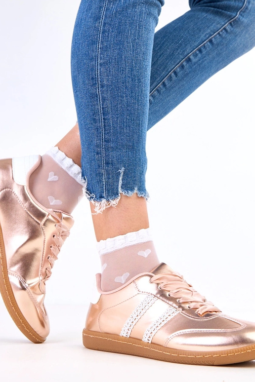 Ténis femininos em tom champanhe com...