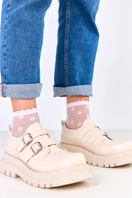 Botas de cano curto na cor areia em...