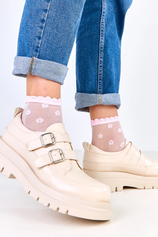 Botas de cano curto na cor areia em...