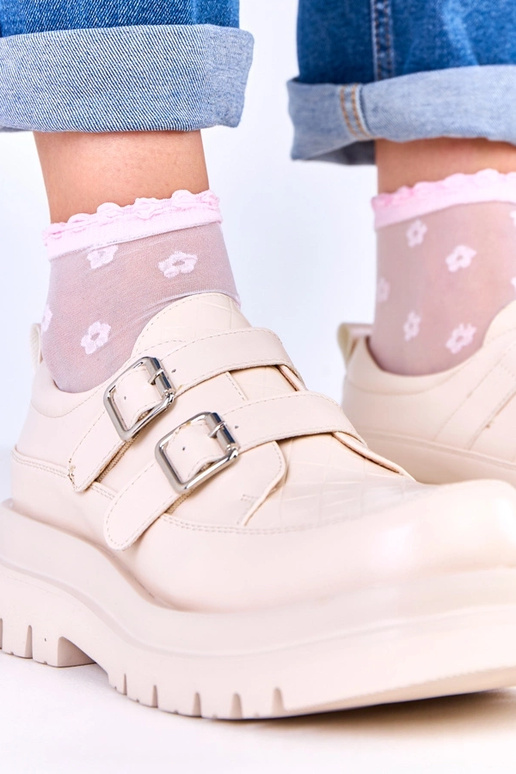 Botas de cano curto na cor areia em...