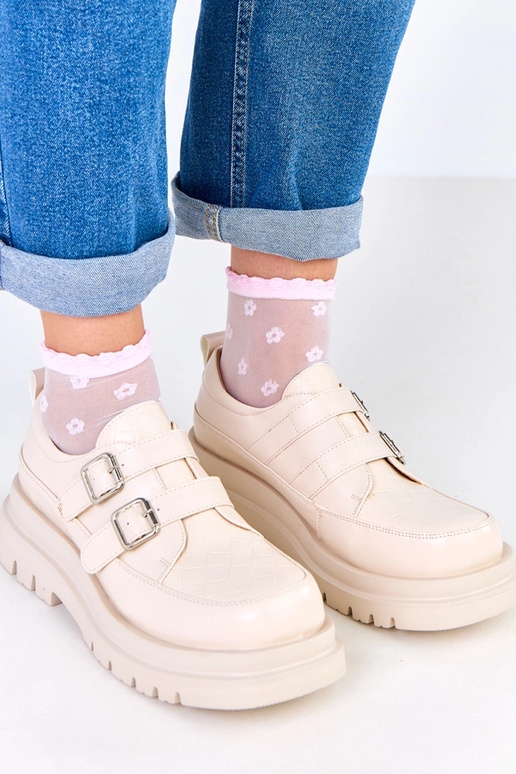 Botas de cano curto na cor areia em...