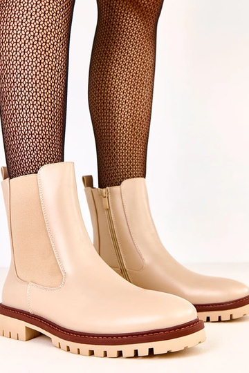 Botins bege com solado plano e detalhe elástico Terrami