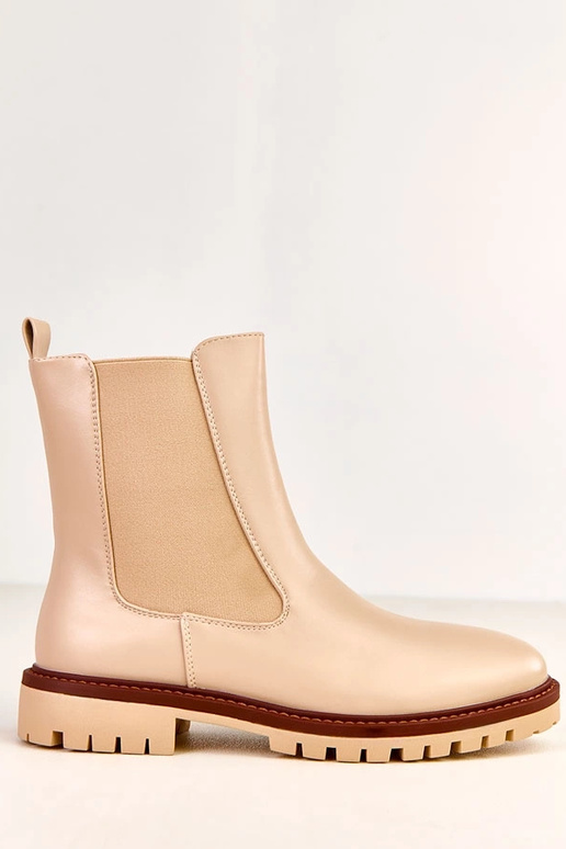 Botins bege com solado plano e... Botins bege com solado plano e...