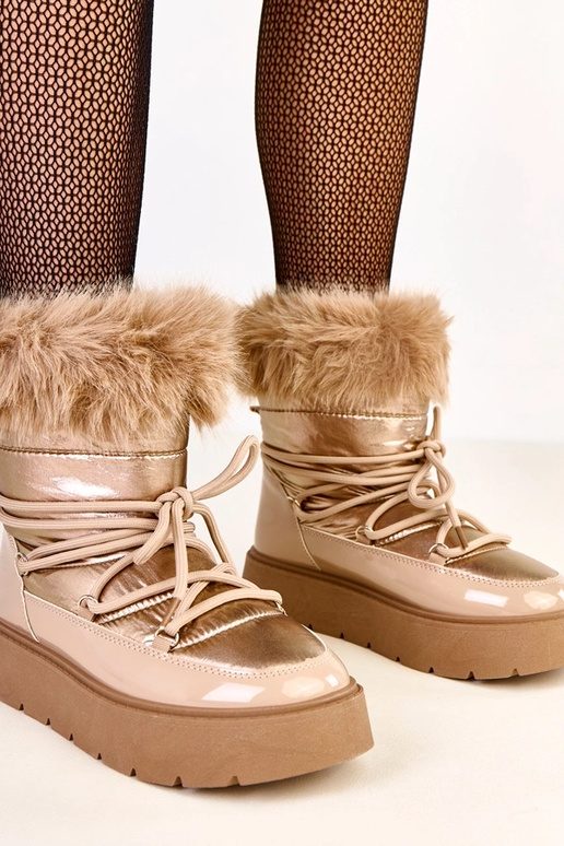 Botas de neve bege com cadarços e... Botas de neve bege com cadarços e...