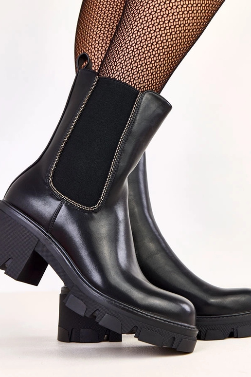 Botins pretos com elástico e... Botins pretos com elástico e...