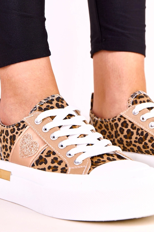 Tênis com estampa de leopardo em... Tênis com estampa de leopardo em...
