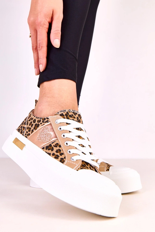 Tênis com estampa de leopardo em... Tênis com estampa de leopardo em...