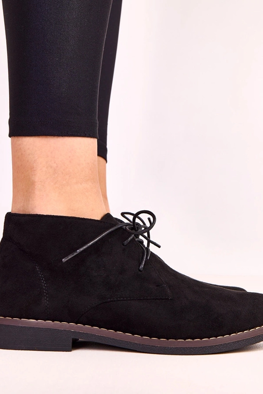 Botins femininos pretos de sola plana... Botins femininos pretos de sola plana...