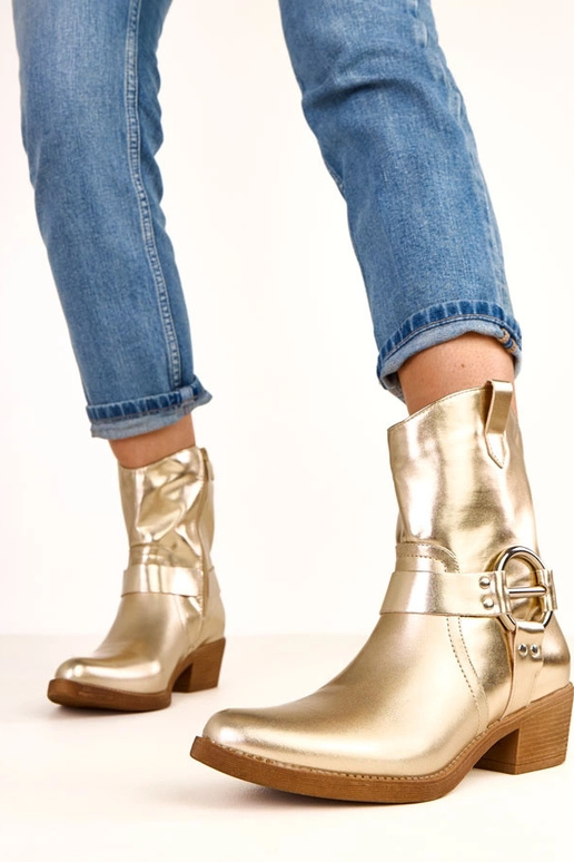 Botas cowboy douradas de salto com... Botas cowboy douradas de salto com...