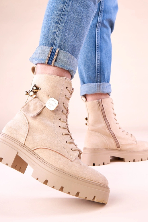 Botas femininas na cor areia com...
