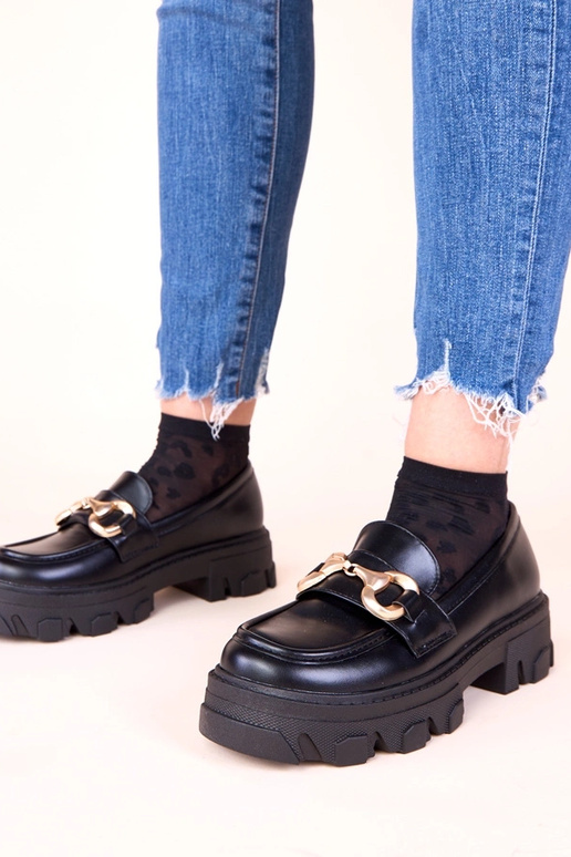 Mocassins pretos com decoração...