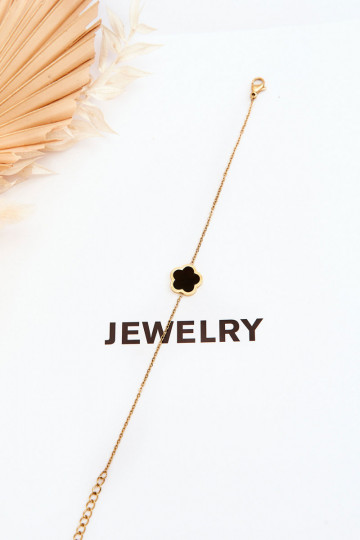Pulseira feminina com flor preta na cor dourada 2