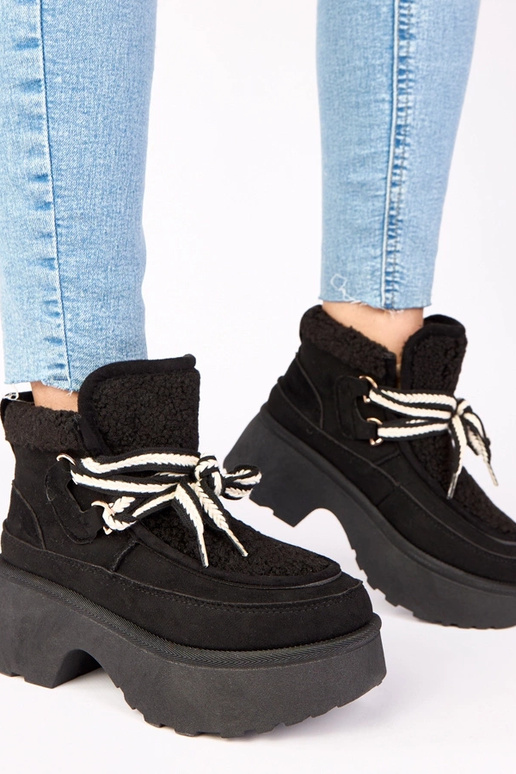 Botas de neve pretas com pelagem em...