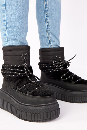 Botas de neve pretas em...