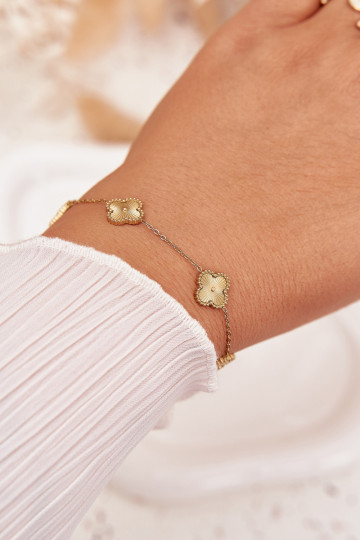 Pulseira de aço inoxidável dourada com motivos florais