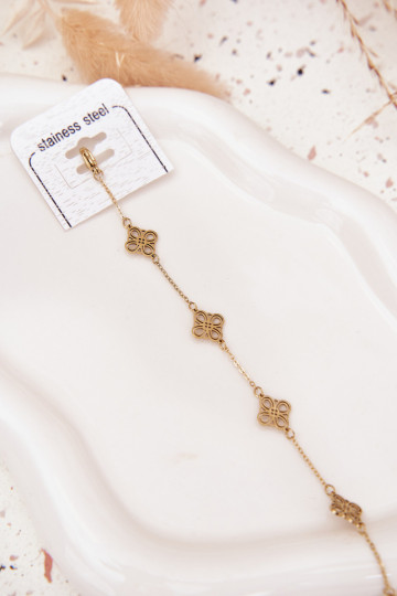 Um bracelete de aço inoxidável Com pingentes cor dourada 2