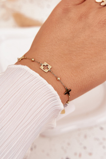 Pulseira de aço inoxidável dourada com pingentes